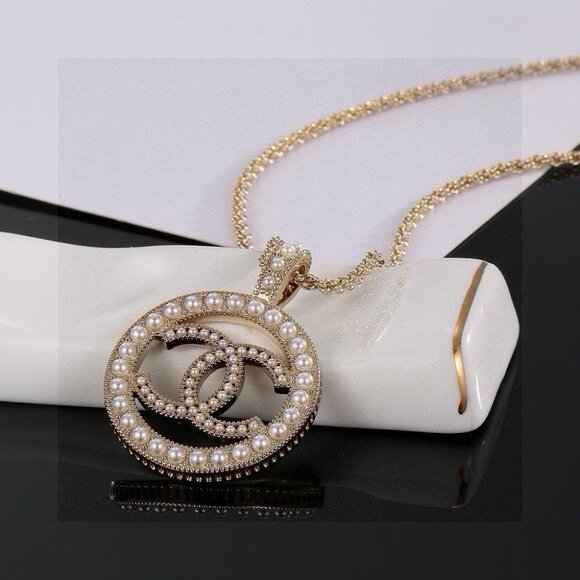 CHANEL Jewelry - Chanel Classic Crystal Double C Logo Round Pendant Necklace